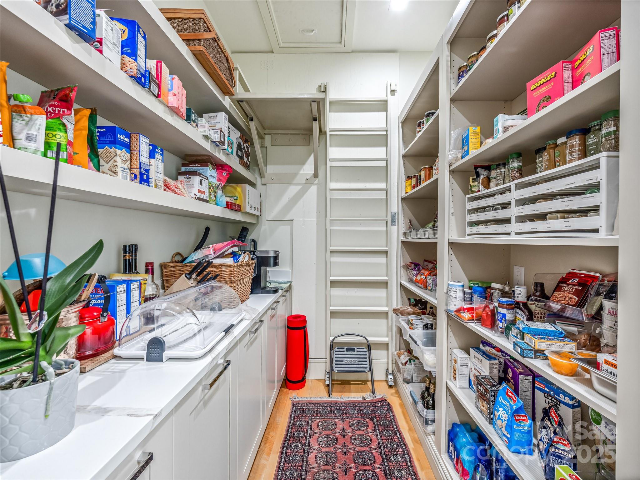 123 Wembley Road Asheville, NC 28804 - Photo 22 of 42 a utility room with lots of clutter and bicycles