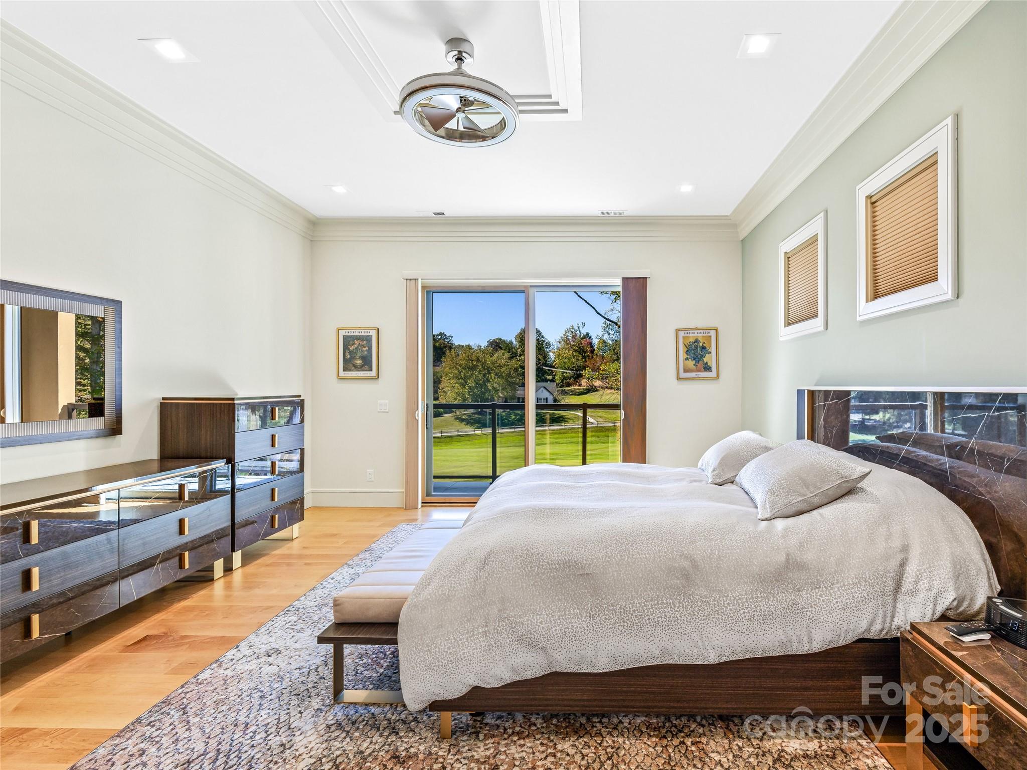 123 Wembley Road Asheville, NC 28804 - Photo 25 of 42 a bed room with a bed tv and a window