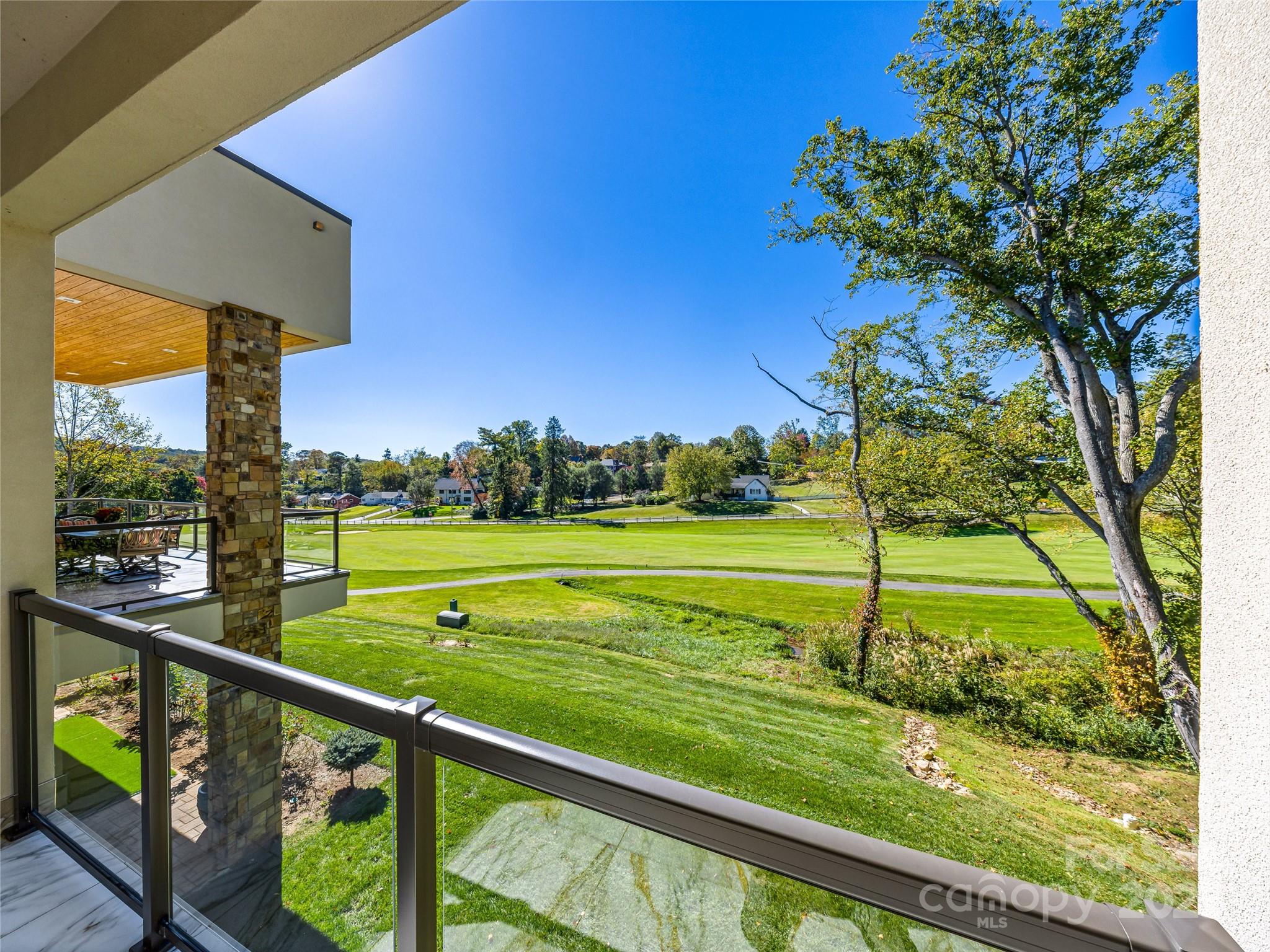 123 Wembley Road Asheville, NC 28804 - Photo 26 of 42 a view of lake from a balcony