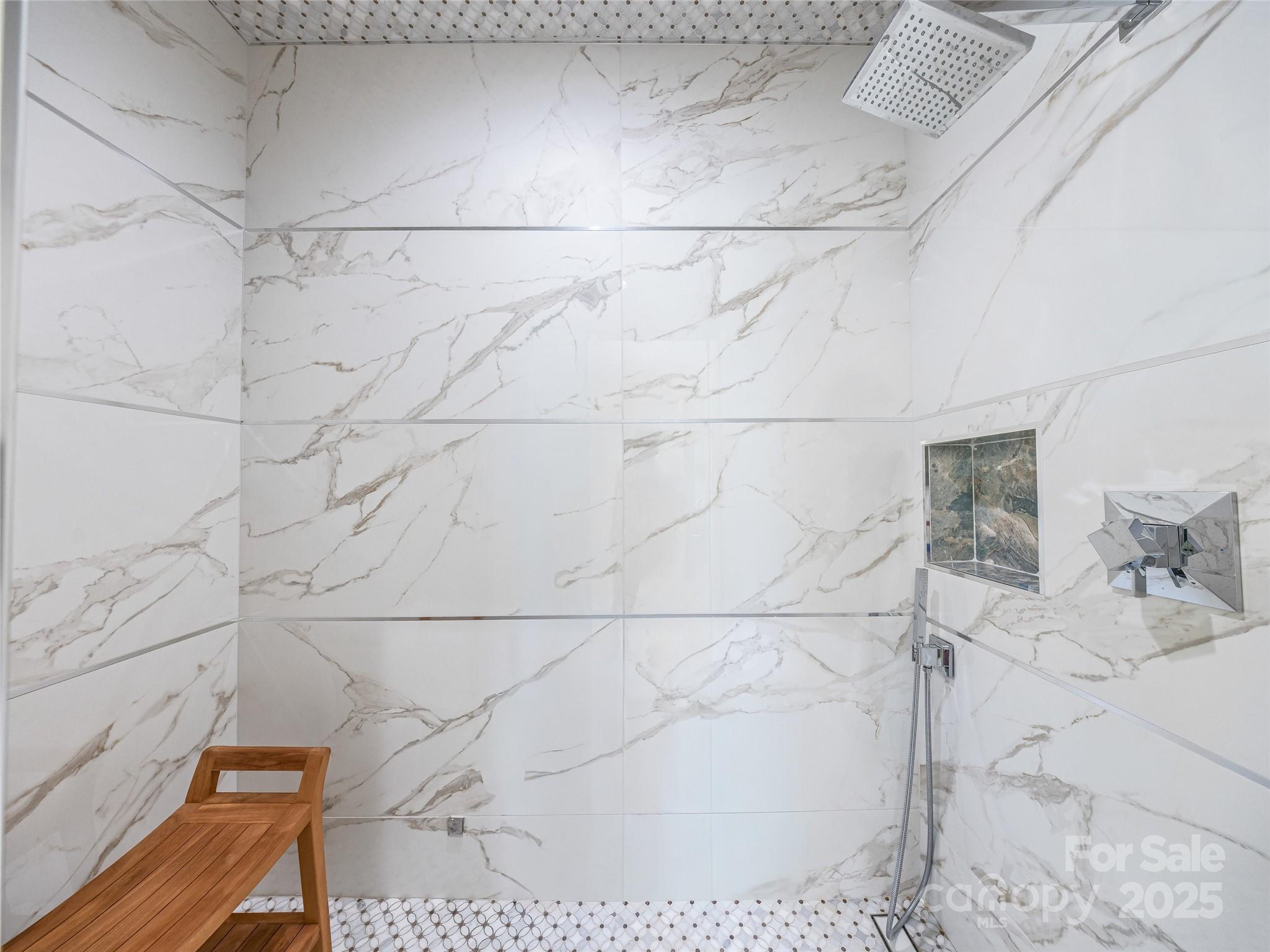 123 Wembley Road Asheville, NC 28804 - Photo 28 of 42 a bathroom with a shower