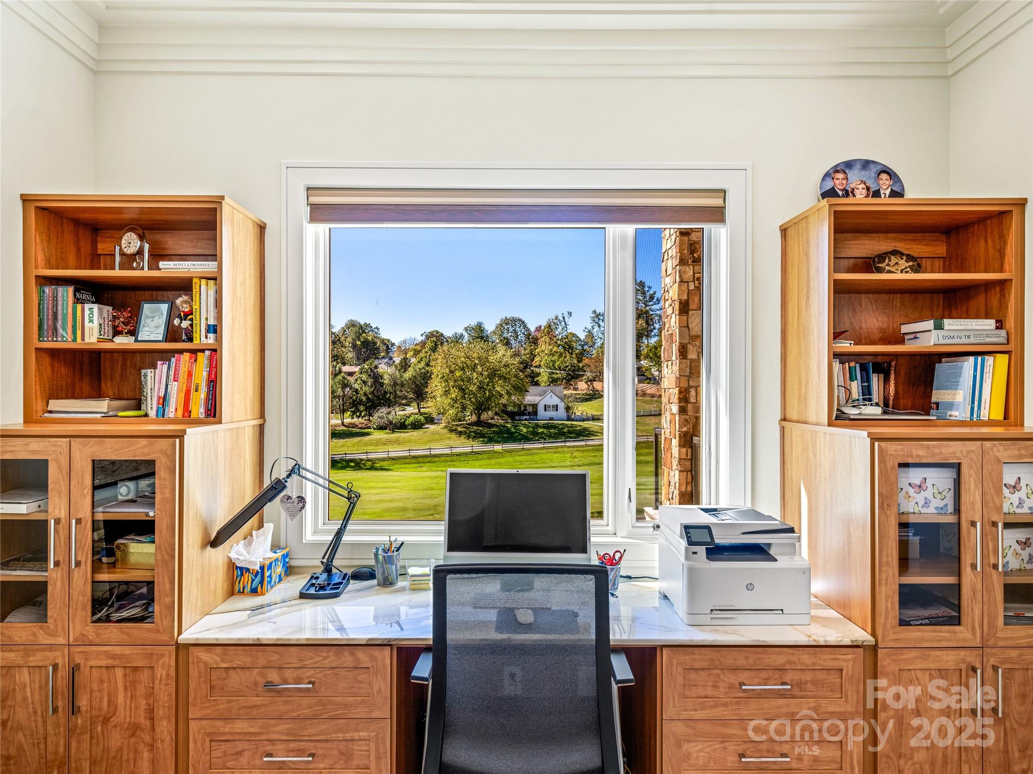 123 Wembley Road Asheville, NC 28804 - Photo 32 of 42 a living room with fireplace furniture and a flat screen tv