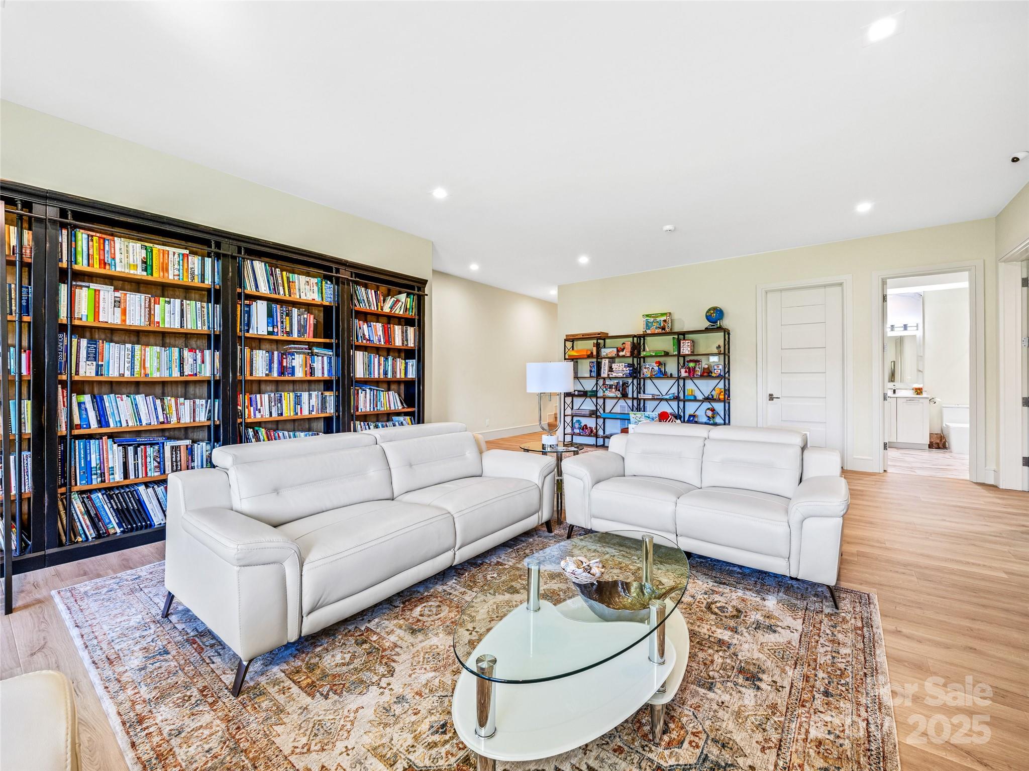 123 Wembley Road Asheville, NC 28804 - Photo 34 of 42 a living room with furniture and a table