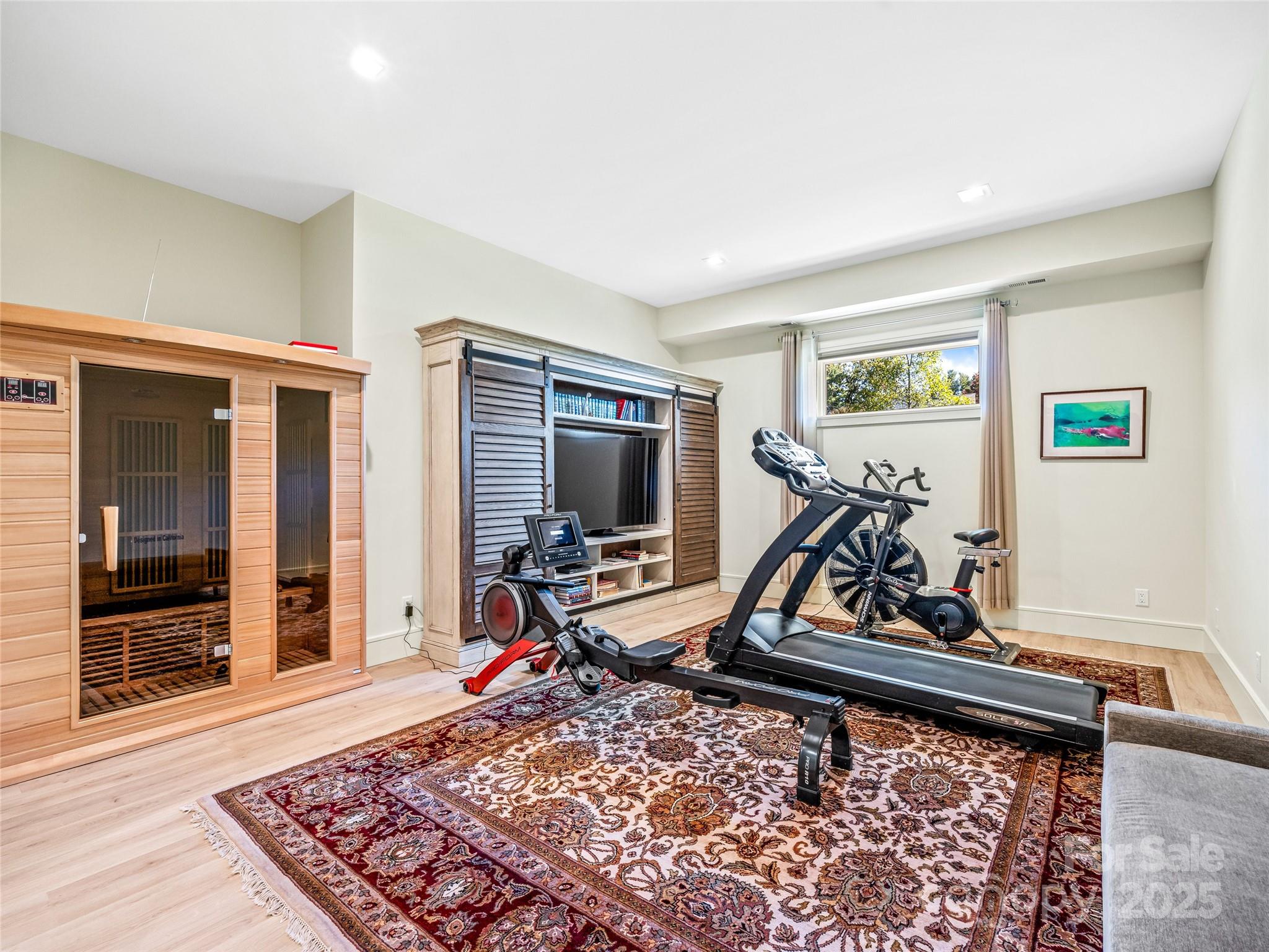123 Wembley Road Asheville, NC 28804 - Photo 36 of 42 a view of a room with gym equipment