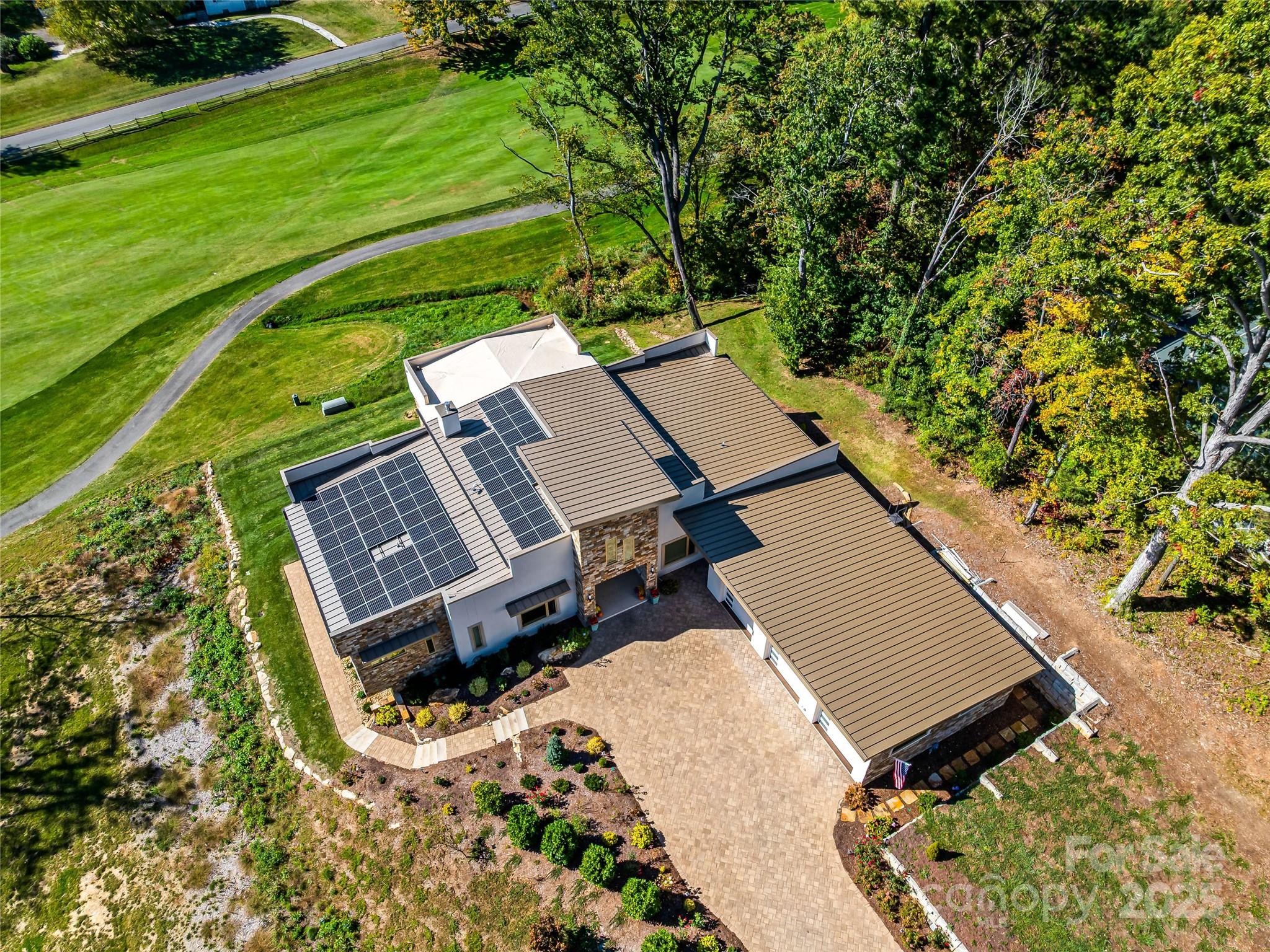 123 Wembley Road Asheville, NC 28804 - Photo 4 of 42 an aerial view of a house with a yard