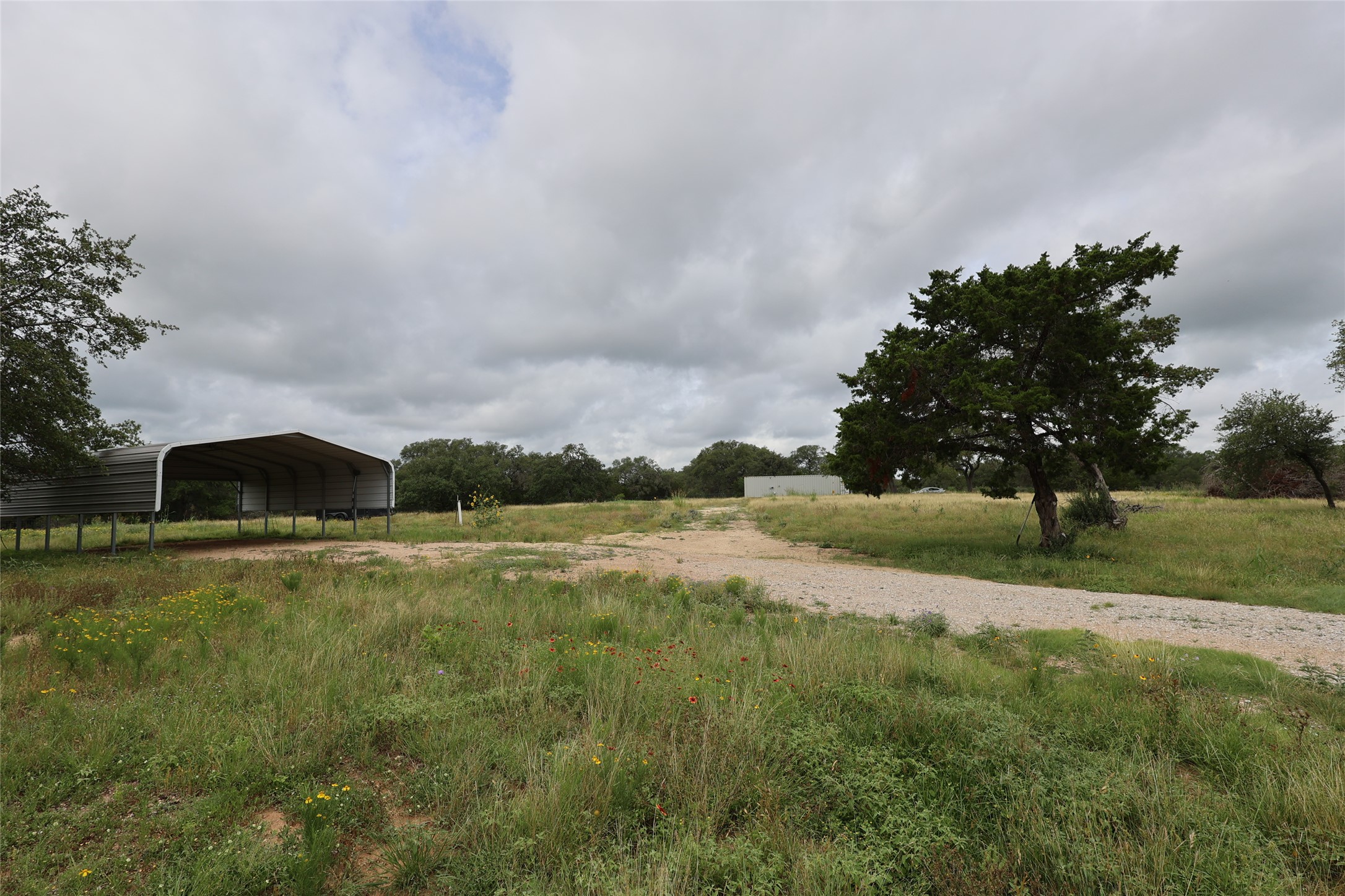 1399 Klett Ranch Road Johnson City, TX 78636 - Photo 12 of 23 a view of an outdoor space and a yard
