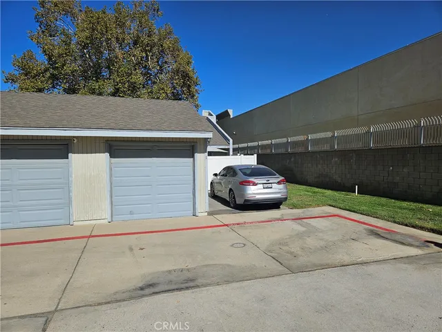a car parked in front of a house