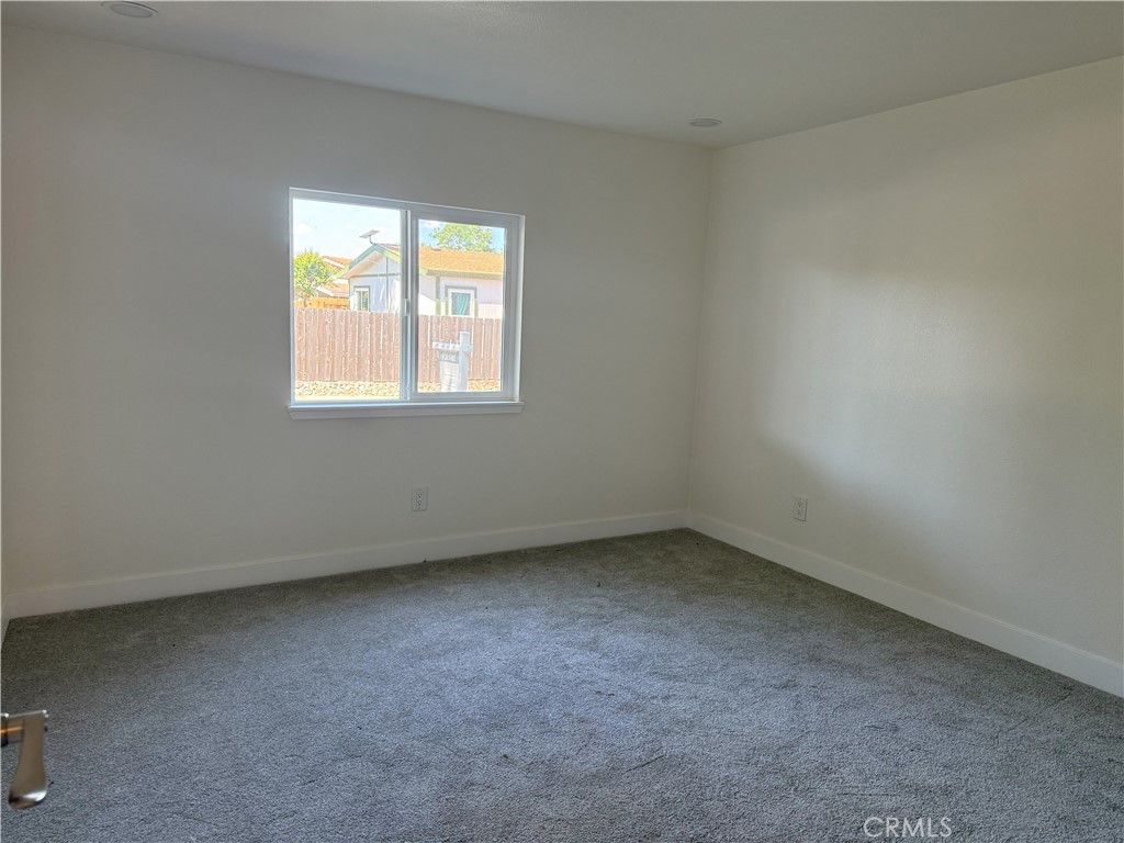 3835 Gardiner Ferry Road, Unit 98 Corning, CA 96021 - Photo 5 of 11 an empty room with a window