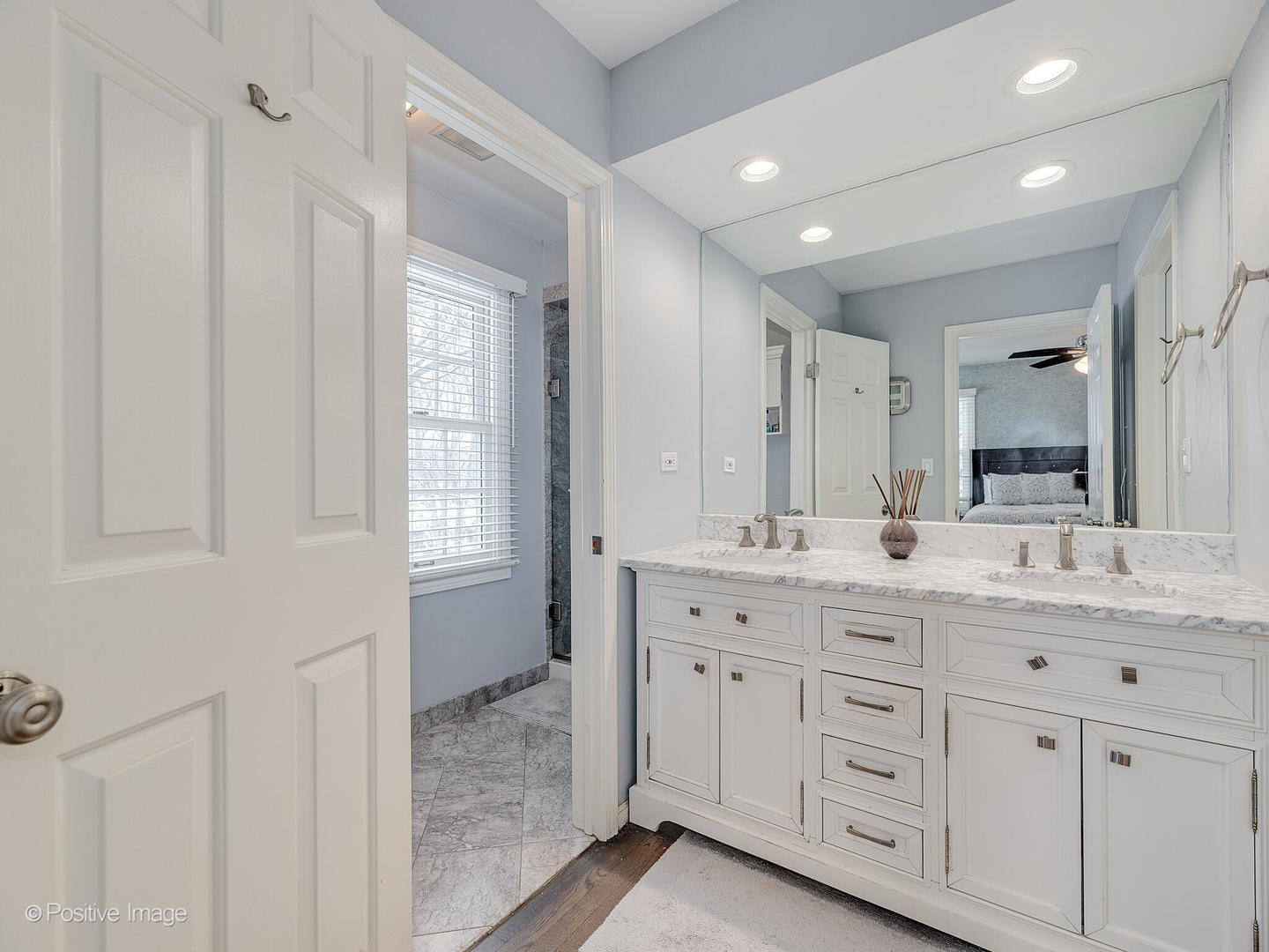 520 County Line Court Hinsdale, IL 60521 - Photo 19 of 33 a bathroom with a granite countertop sink mirror and window