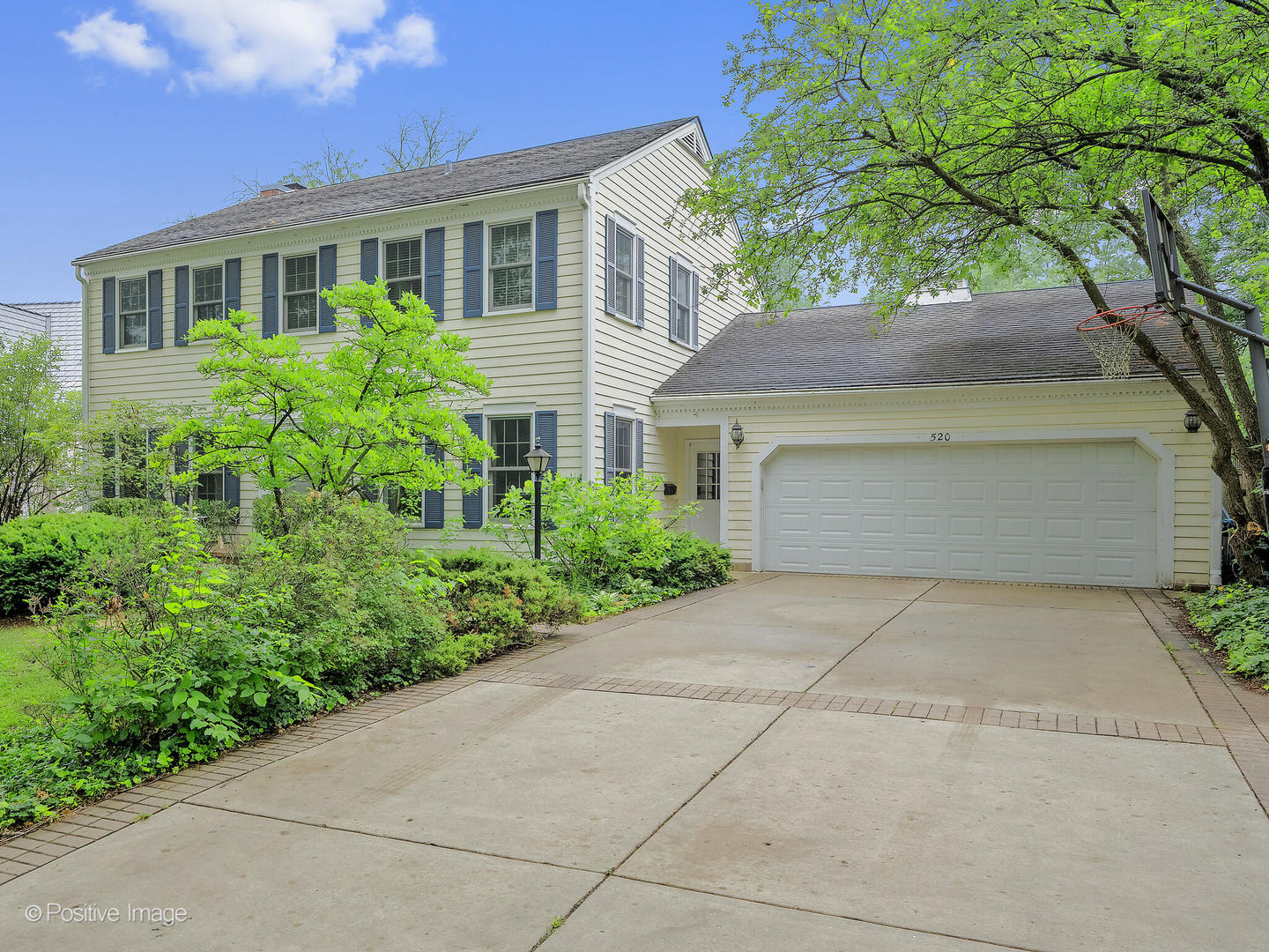 520 County Line Court Hinsdale, IL 60521 - Photo 2 of 33 a front view of a house with garden