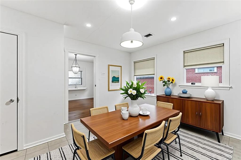 1431 Sharon Street Northwest Atlanta, GA 30314 - Photo 15 of 44 a view of a dining room with furniture and window