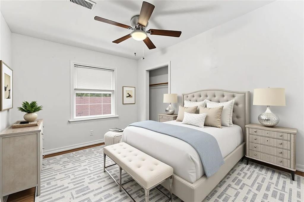 1431 Sharon Street Northwest Atlanta, GA 30314 - Photo 21 of 44 a bedroom with a large bed and a window