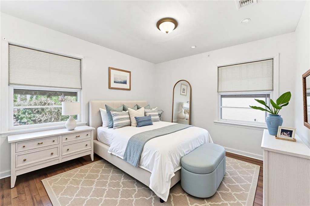 1431 Sharon Street Northwest Atlanta, GA 30314 - Photo 24 of 44 a bedroom with a large bed and a window