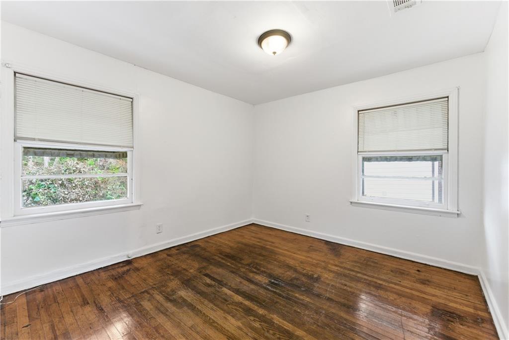 1431 Sharon Street Northwest Atlanta, GA 30314 - Photo 32 of 44 an empty room with a window