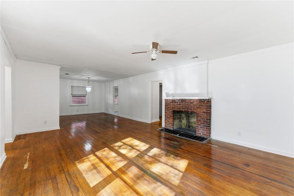 1431 Sharon Street Northwest Atlanta, GA 30314 - Photo 38 of 44 a view of empty room with a fireplace