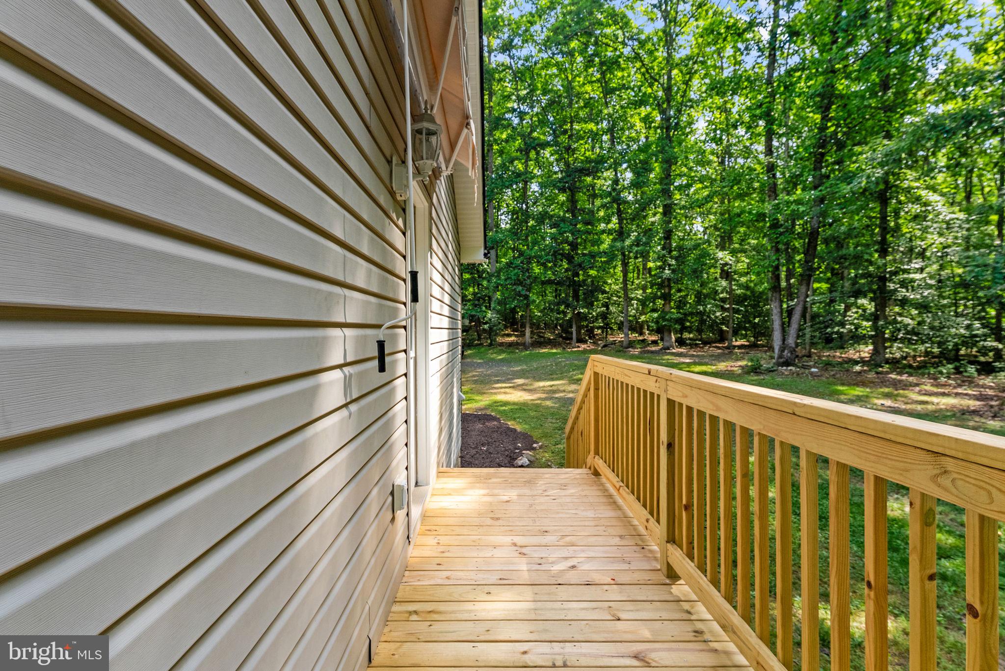 20065 Crooked Run Road Culpeper, VA 22701 - Photo 45 of 62 a view of a balcony with wooden floor
