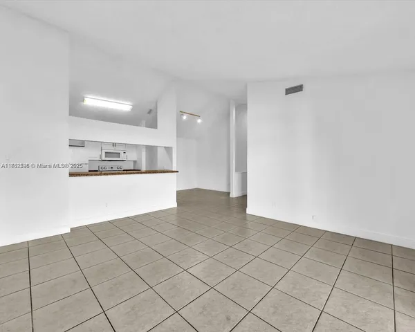 a view of a glass door and the porch