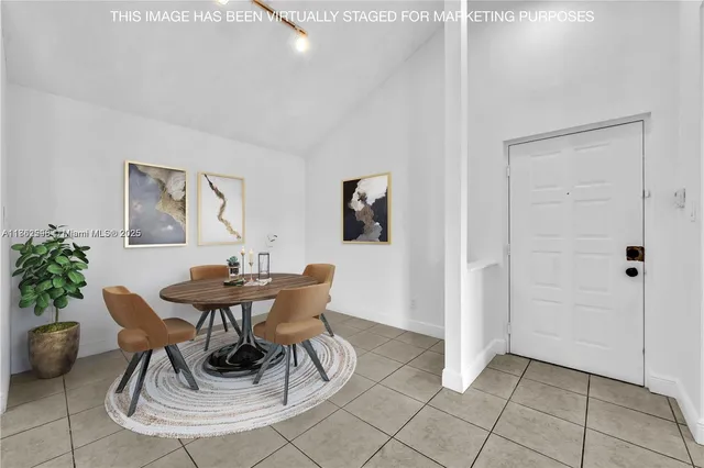 an empty room with white walls