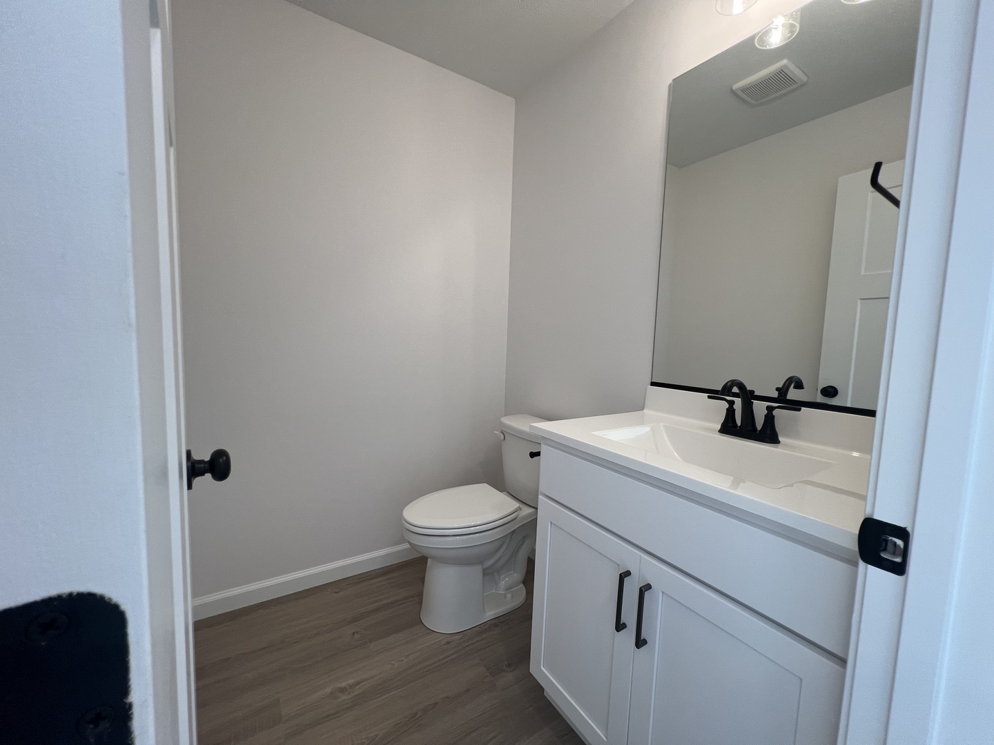 14 Eric Court Bloomington, IL 61705 - Photo 13 of 22 a bathroom with a sink and a toilet