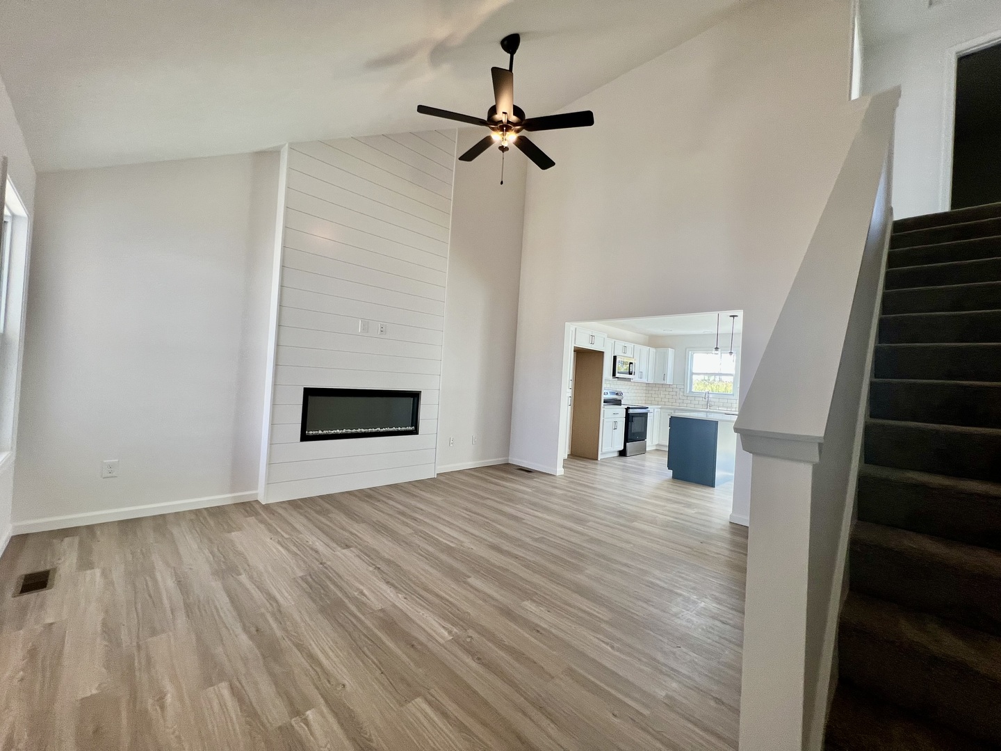 14 Eric Court Bloomington, IL 61705 - Photo 3 of 22 a view of an empty room with a fireplace