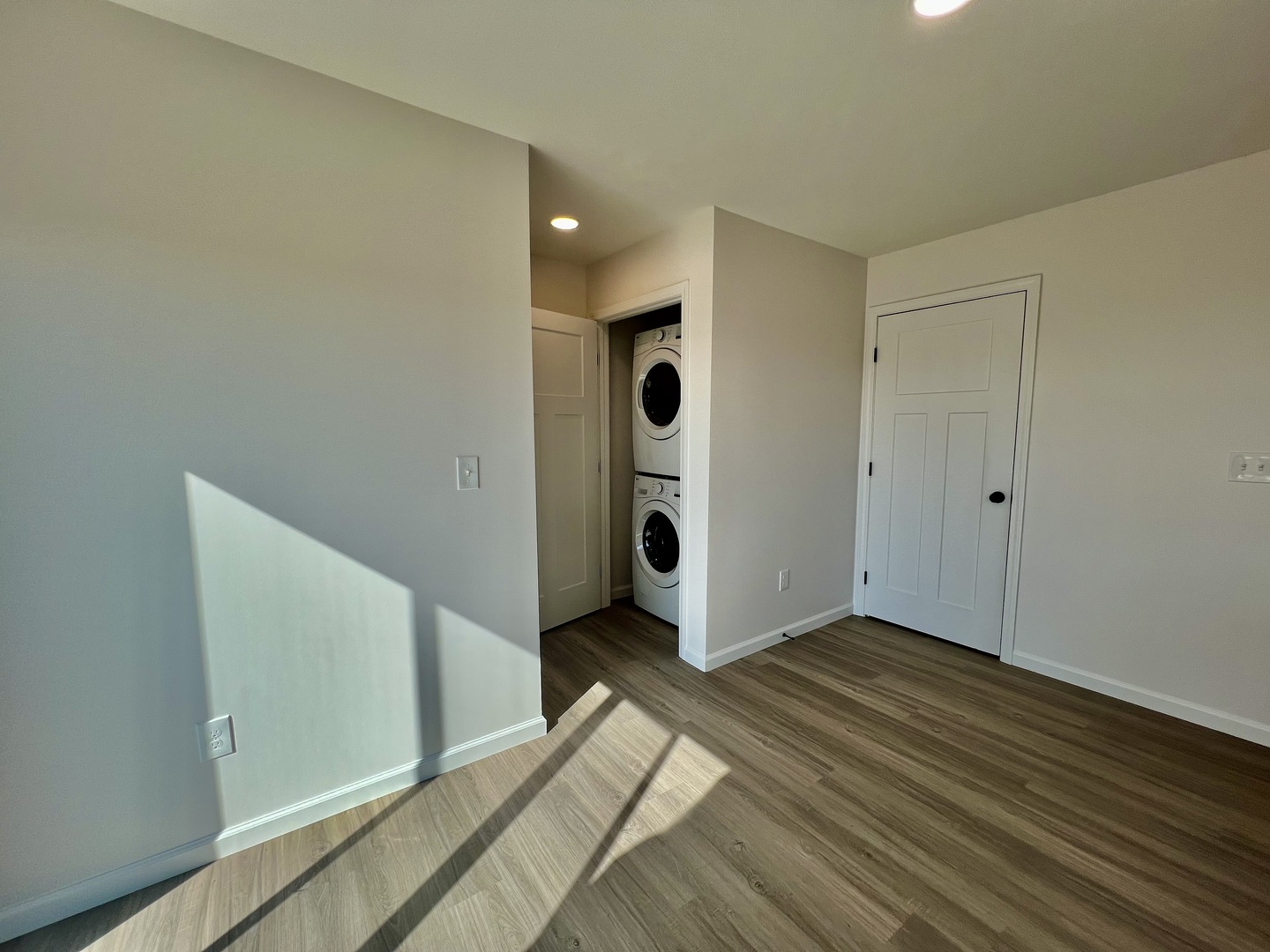 14 Eric Court Bloomington, IL 61705 - Photo 8 of 22 a view of an empty room with wooden floor