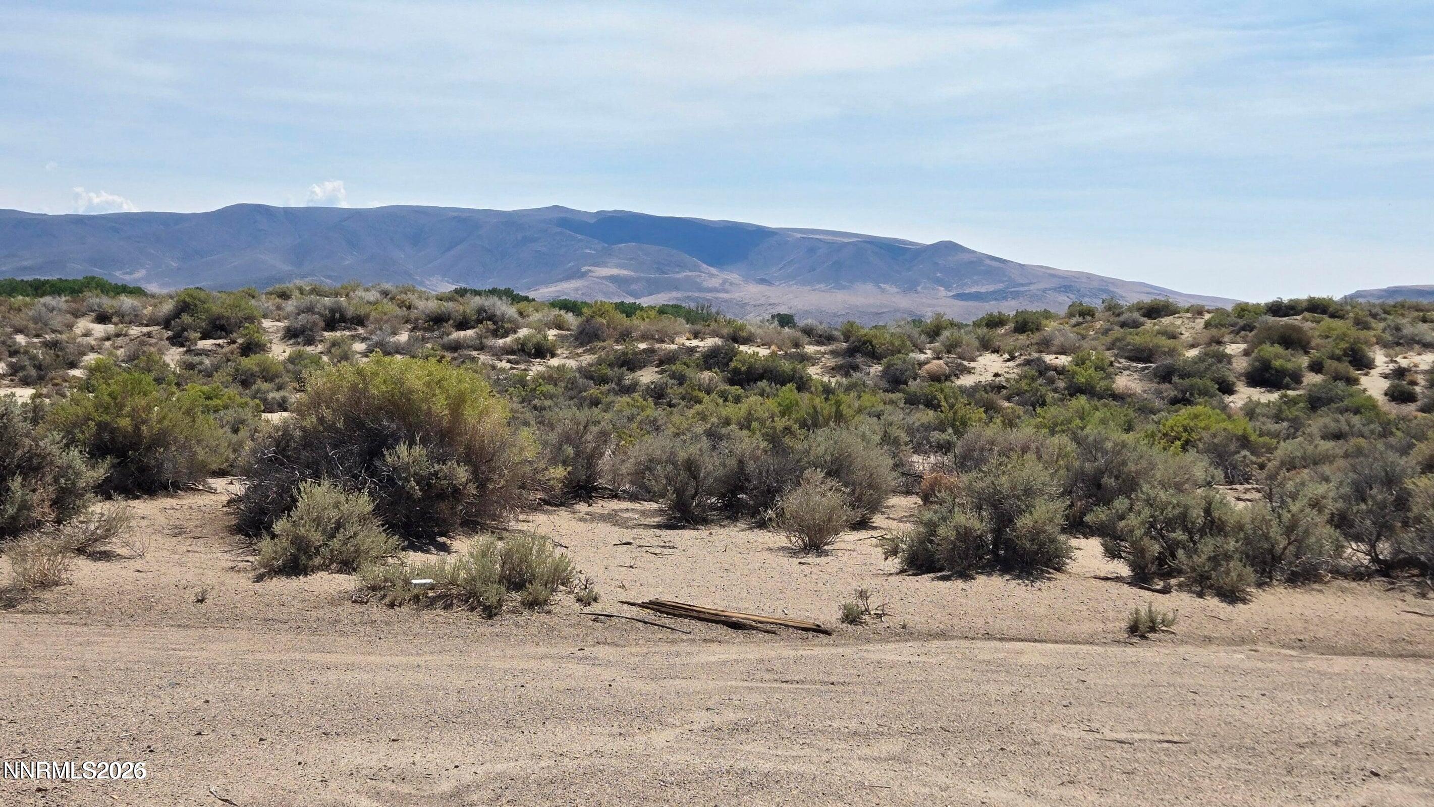 8315 Magnolia Street Silver Springs, NV 89429 - Photo 2 of 2 a view of a mountain with a outdoor space