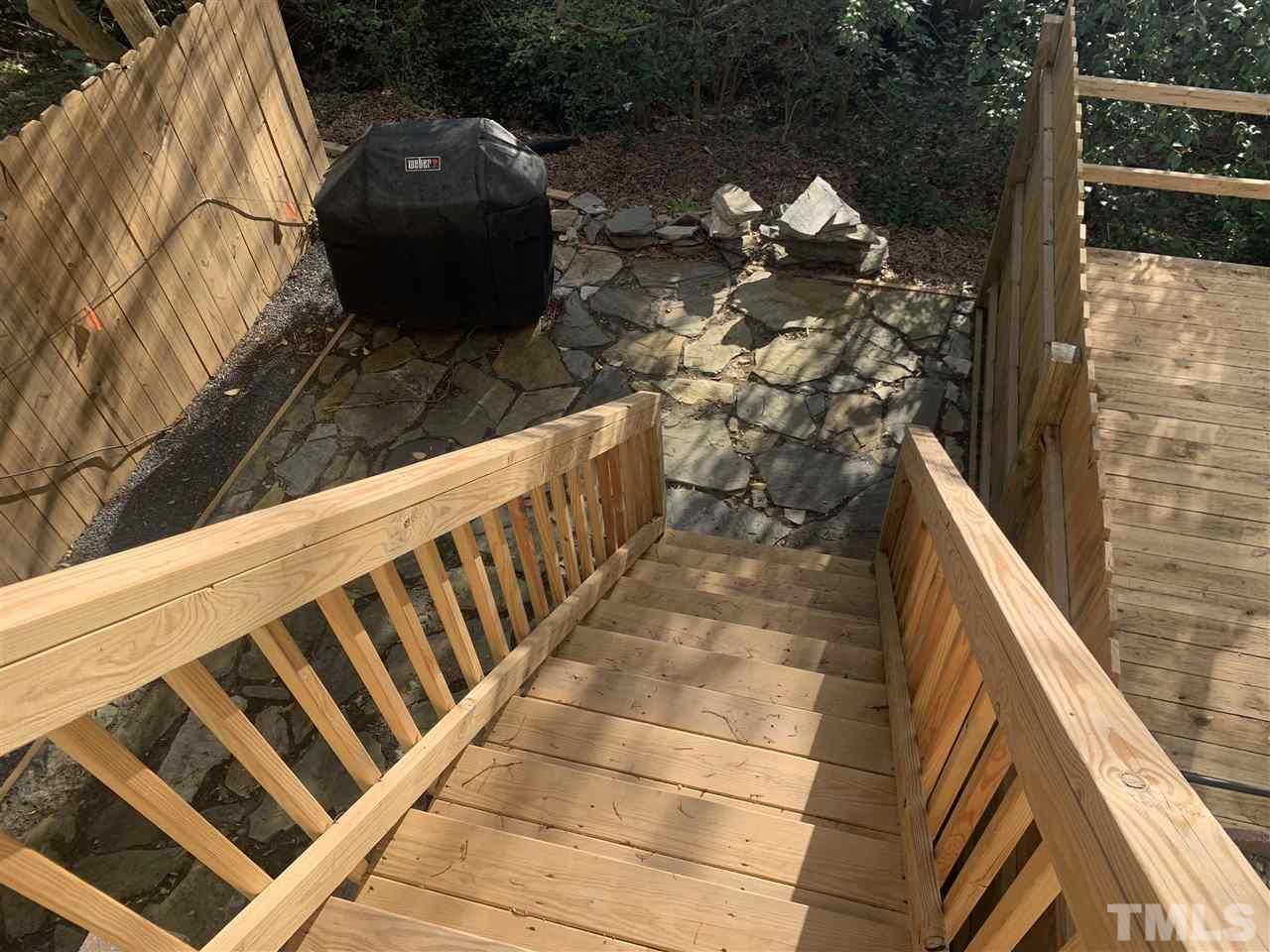 7731 Kelley Court Raleigh, NC 27615 - Photo 14 of 14 a view of balcony with wooden floor