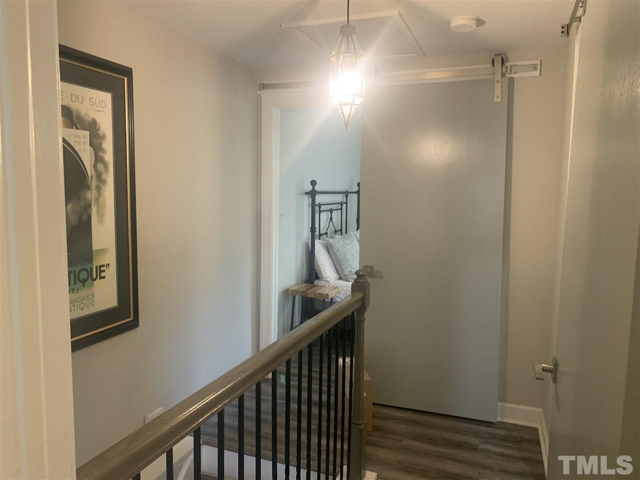 7731 Kelley Court Raleigh, NC 27615 - Photo 7 of 14 a view of a hallway