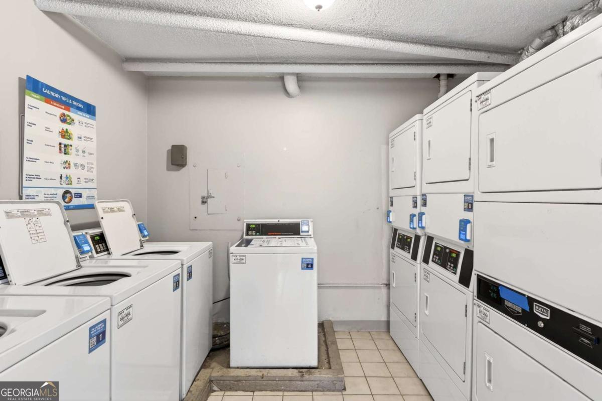 2285 Peachtree Road, Unit 1106 Atlanta, GA 30309 - Photo 17 of 27 a utility room with dryer and washer