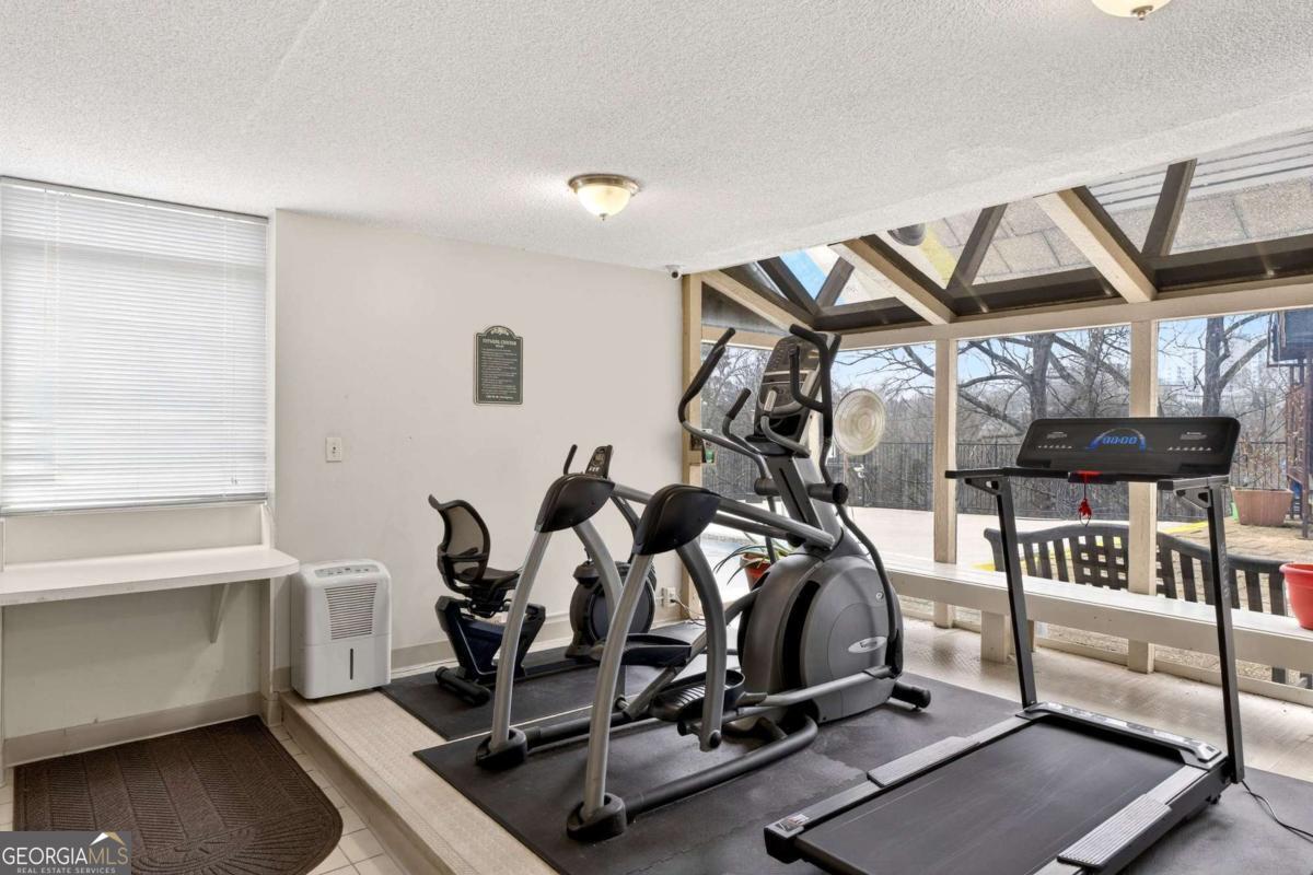 2285 Peachtree Road, Unit 1106 Atlanta, GA 30309 - Photo 20 of 27 a view of a room with gym equipment