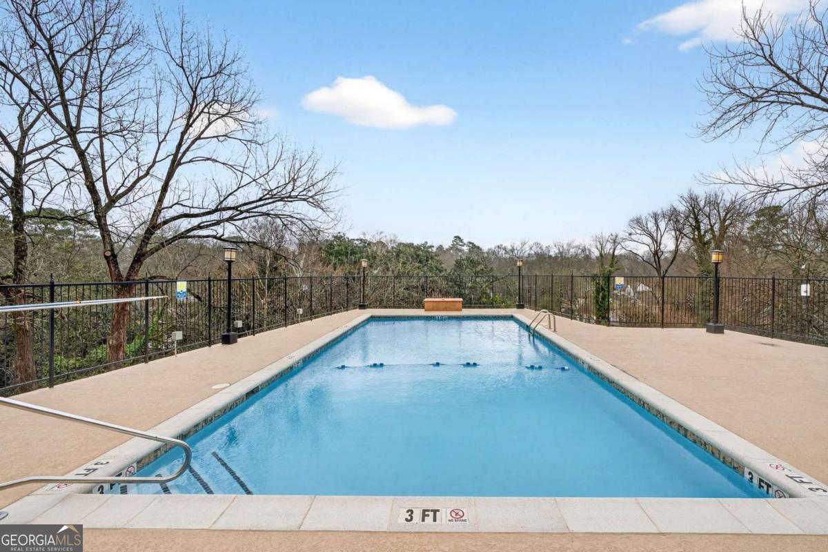 2285 Peachtree Road, Unit 1106 Atlanta, GA 30309 - Photo 22 of 27 a view of swimming pool with a yard