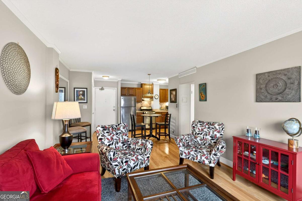 2285 Peachtree Road, Unit 1106 Atlanta, GA 30309 - Photo 9 of 27 a living room with furniture