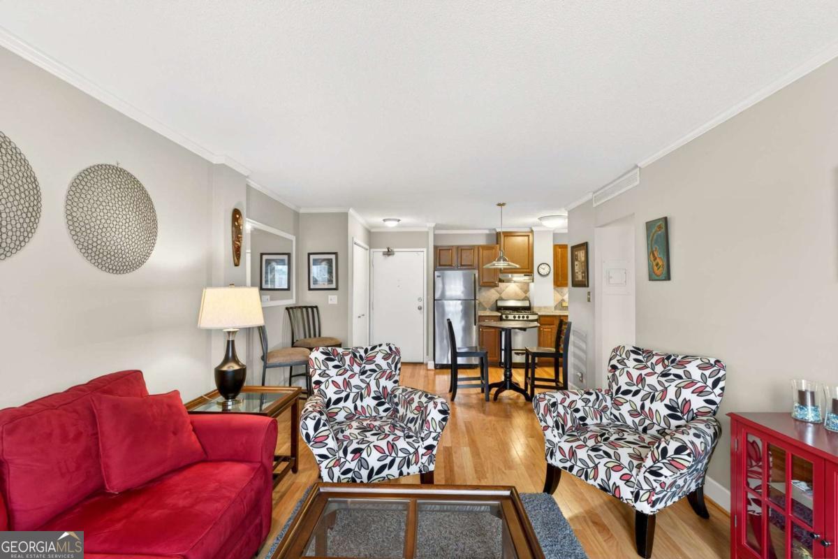 2285 Peachtree Road, Unit 1106 Atlanta, GA 30309 - Photo 10 of 27 a living room with furniture