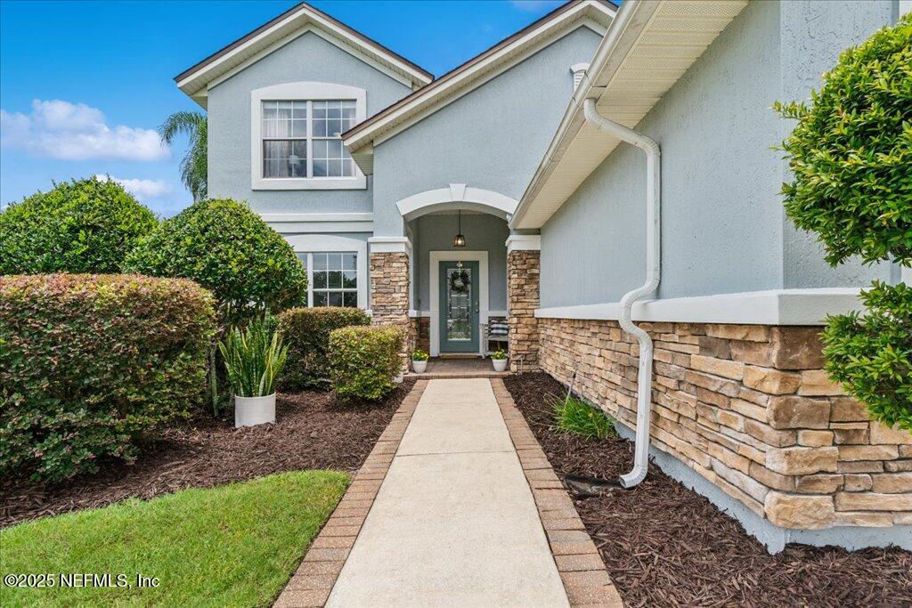 800 Marjories Way St. Augustine, FL 32092 - Photo 20 of 38 a front view of house with yard