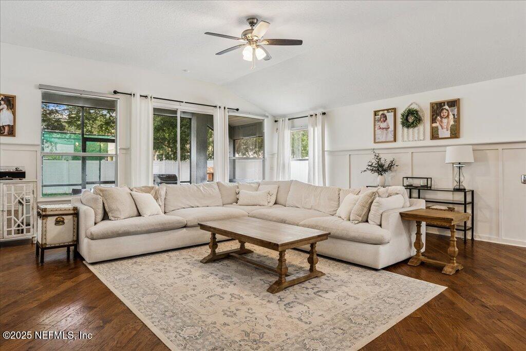 800 Marjories Way St. Augustine, FL 32092 - Photo 2 of 38 a living room with furniture and a large window