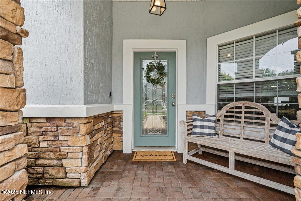 800 Marjories Way St. Augustine, FL 32092 - Photo 21 of 38 a bedroom with a bed and a window