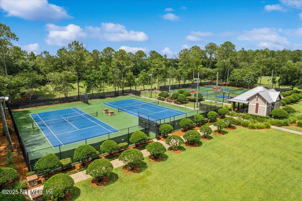 800 Marjories Way St. Augustine, FL 32092 - Photo 35 of 38 a view of a backyard with plants and patio