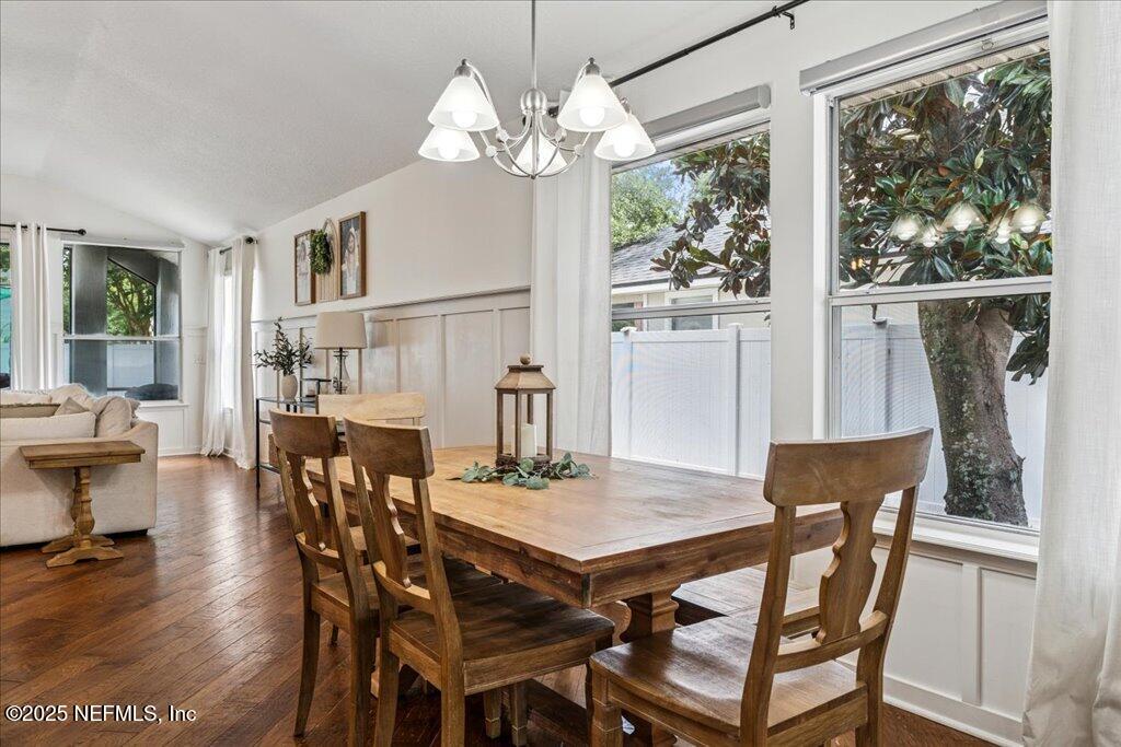 800 Marjories Way St. Augustine, FL 32092 - Photo 9 of 38 a view of a dining room with furniture window and wooden floor