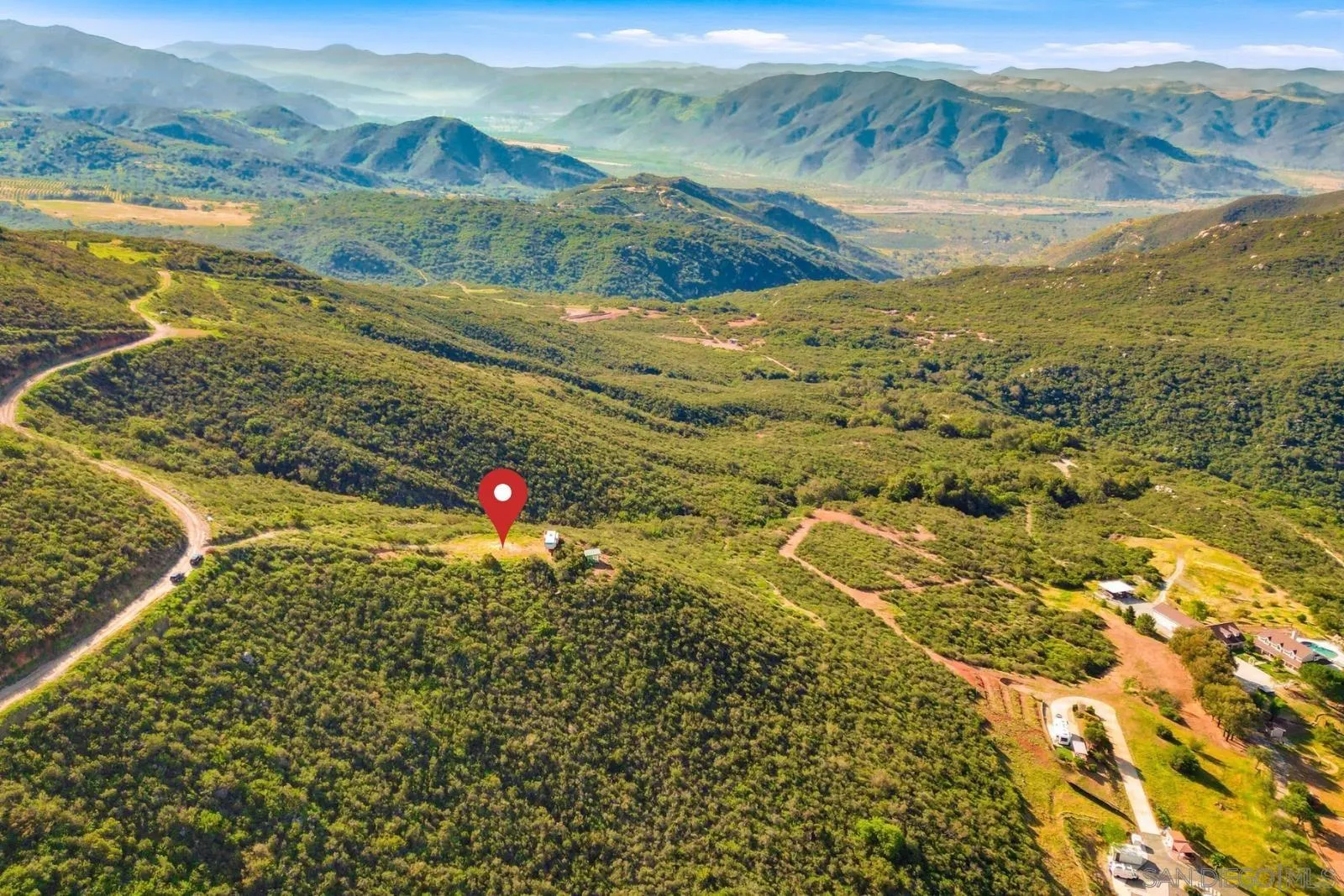 0 Sunset Peak, Unit 7 Pala, CA 92059 - Photo 15 of 22 a view of an ocean and a mountain
