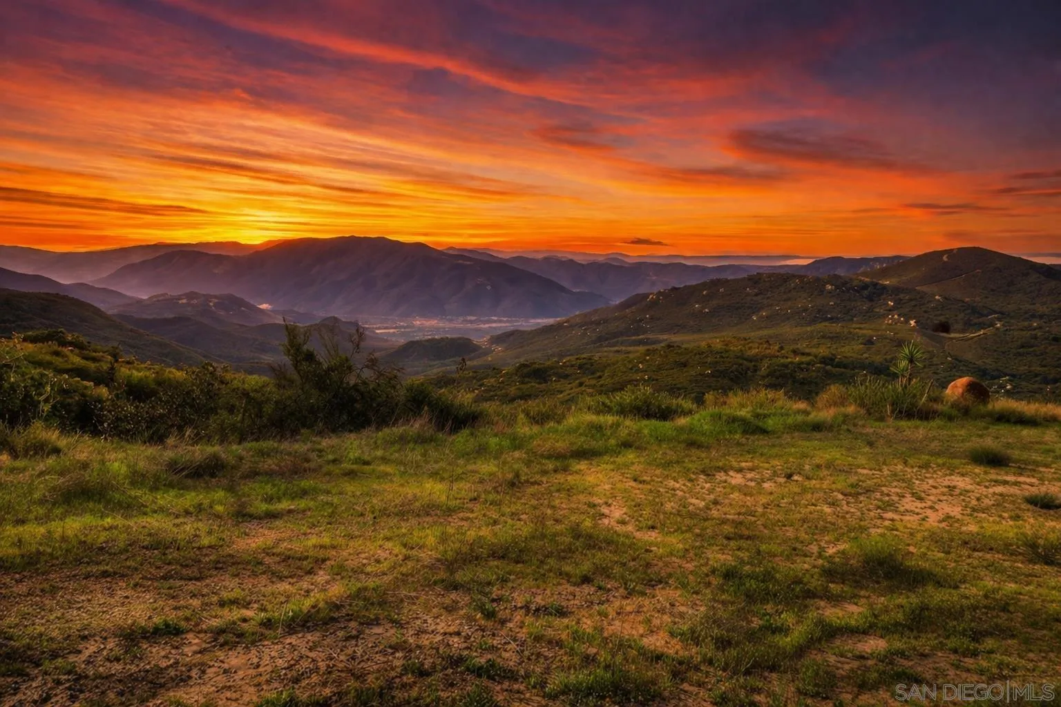 0 Sunset Peak, Unit 7 Pala, CA 92059 - Photo 18 of 22 a view of an ocean with mountains in the background