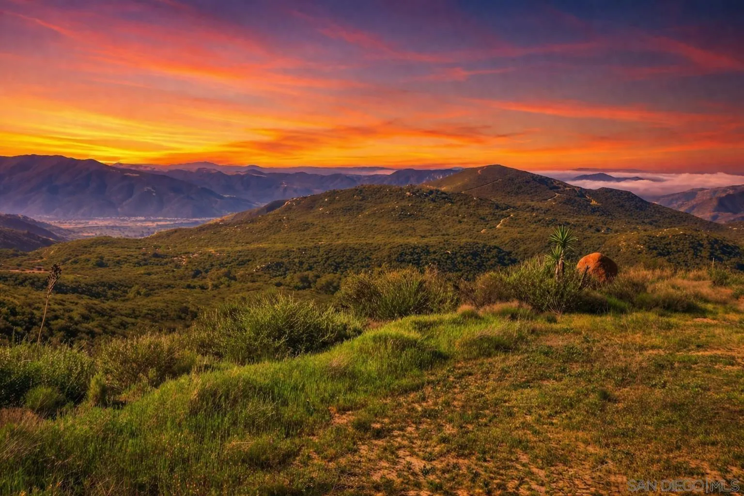 0 Sunset Peak, Unit 7 Pala, CA 92059 - Photo 20 of 22 a view of a city with mountains in the background