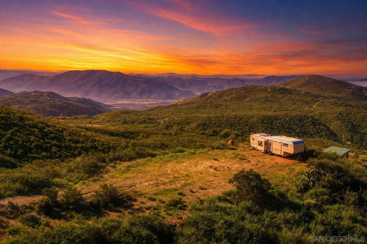 0 Sunset Peak, Unit 7 Pala, CA 92059 - Photo 2 of 22 a view of a town with mountains in the background