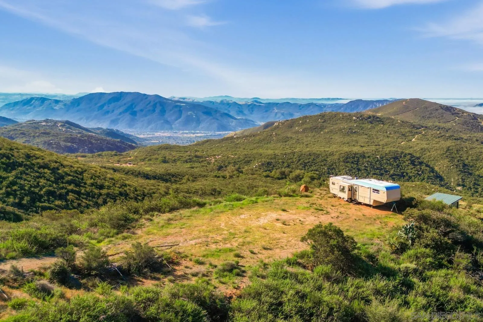 0 Sunset Peak, Unit 7 Pala, CA 92059 - Photo 3 of 22 a view of a mountain with an ocean