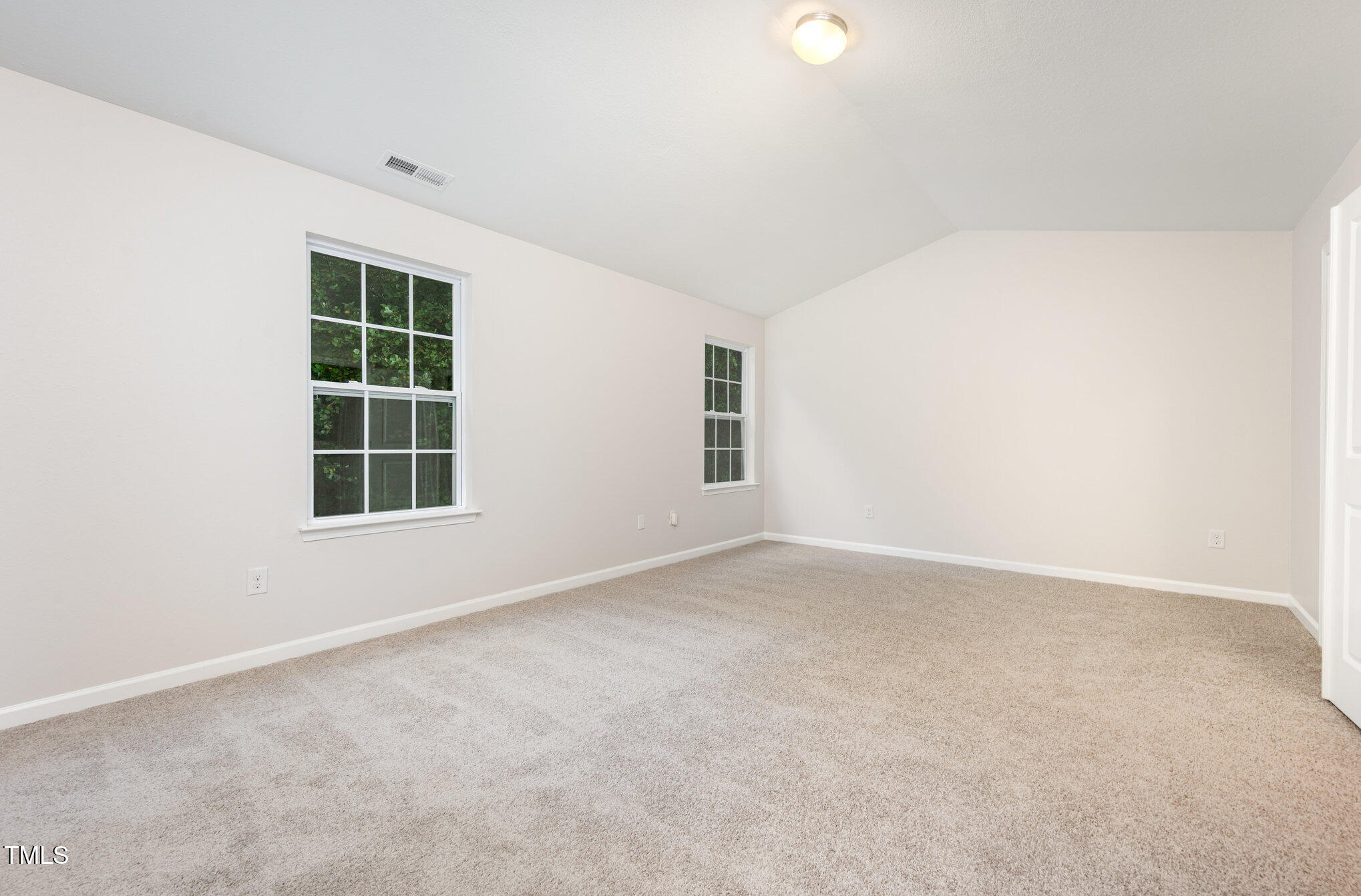 356 Botanical Court Bunnlevel, NC 28323 - Photo 16 of 31 an empty room with a window