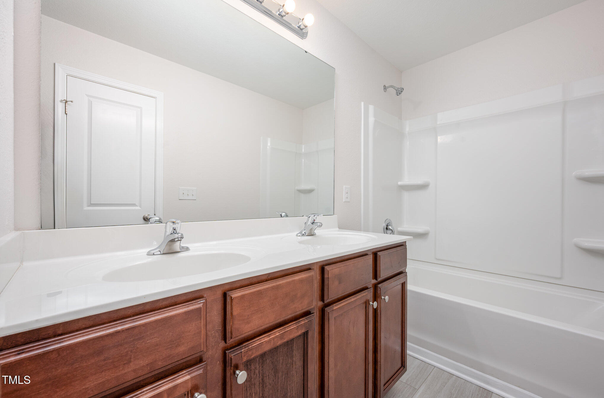 356 Botanical Court Bunnlevel, NC 28323 - Photo 19 of 31 a bathroom with a sink and a bathtub