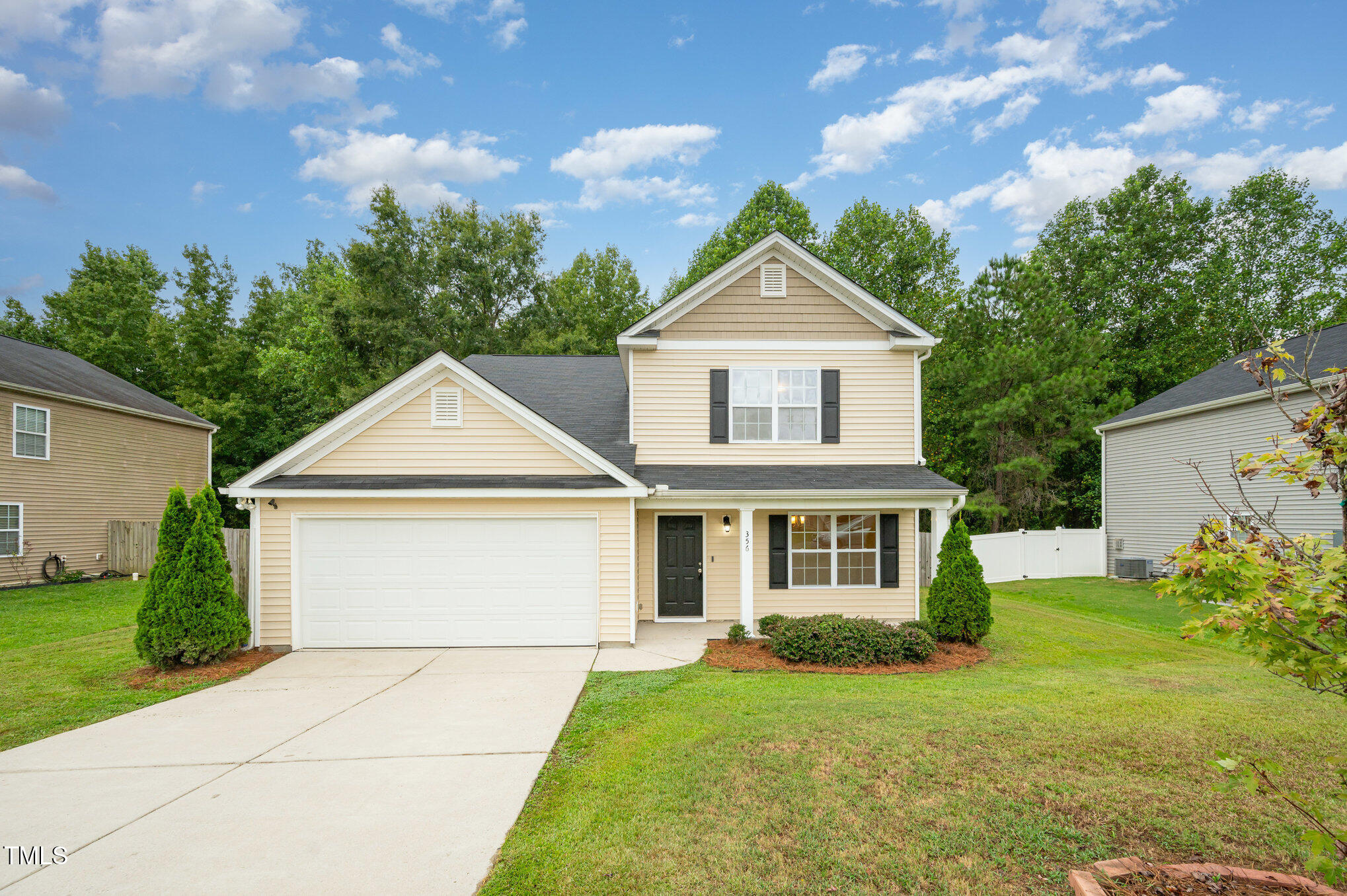 356 Botanical Court Bunnlevel, NC 28323 - Photo 2 of 31 front view of a house with a yard