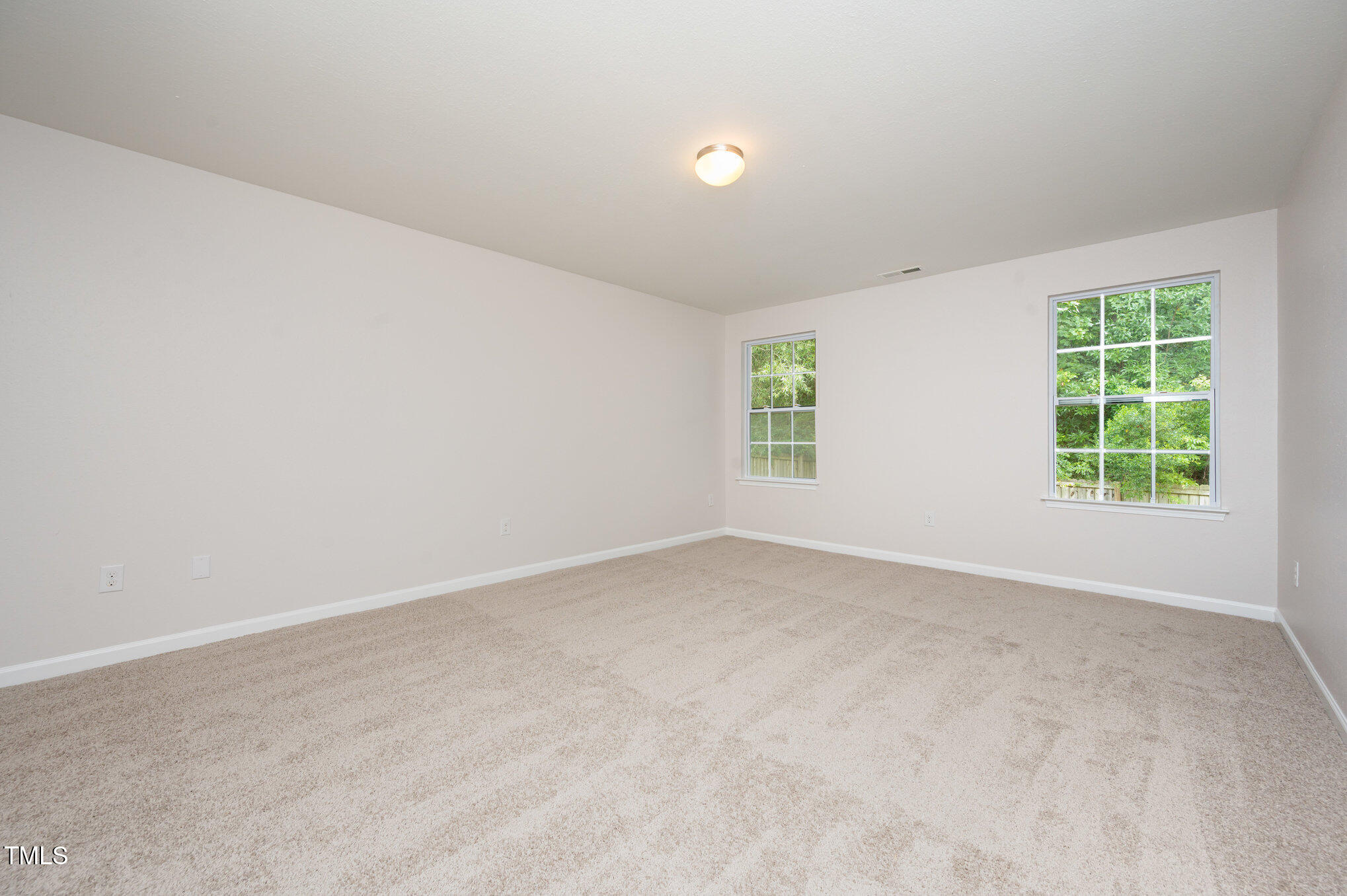 356 Botanical Court Bunnlevel, NC 28323 - Photo 21 of 31 an empty room with a window