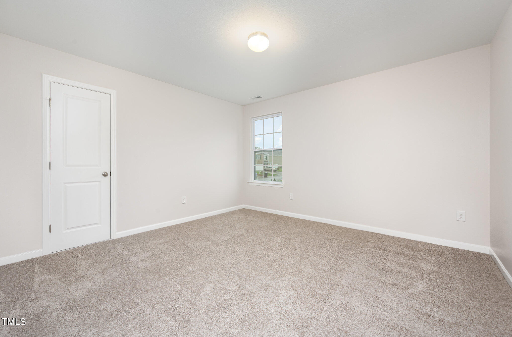 356 Botanical Court Bunnlevel, NC 28323 - Photo 24 of 31 an empty room with a window