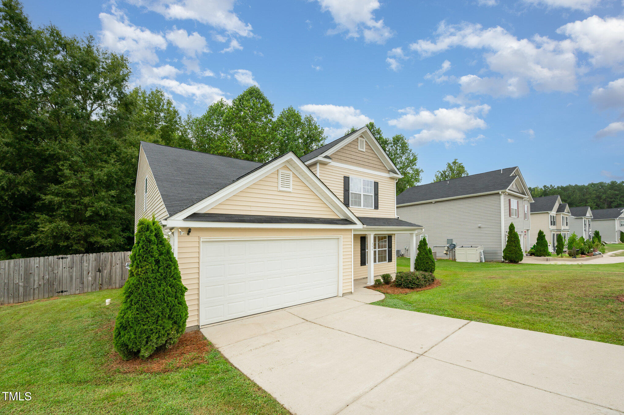 356 Botanical Court Bunnlevel, NC 28323 - Photo 4 of 31 a view of a house with a yard