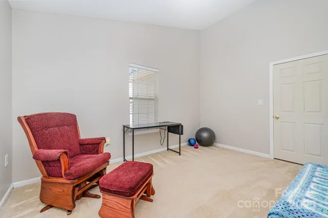 a view of a livingroom with furniture