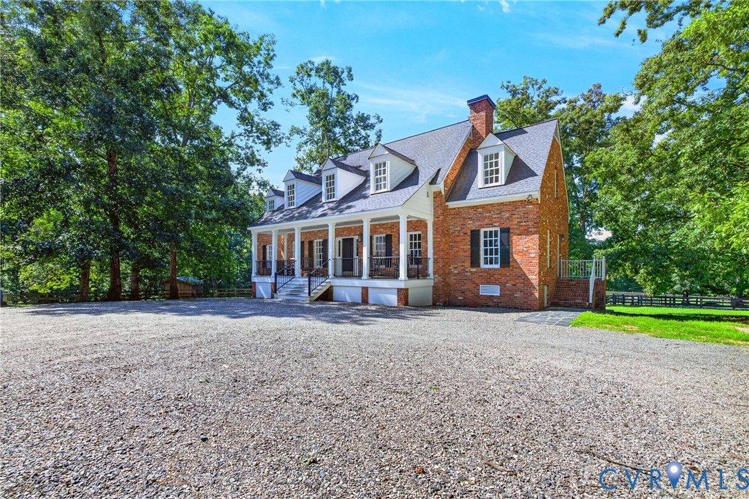 1108 Shallow Well Road Manakin-Sabot, VA 23103 - Photo 65 of 86 Brick exterior with white trim, a covered porch wi